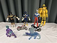 Full shot showing all figures including Power Rangers, motorcycles, and dragons