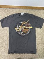 Full front view showing graphic of Wile E. Coyote and Harley Davidson logo on black T-shirt.