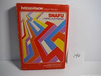 Front of original orange box for Intellivision game SNAFU showing colorful geometric design and game title.