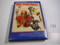 Front view of game box showing title, football player artwork, and condition.