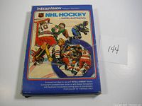 Original box showing artwork of ice hockey players and Intellivision branding