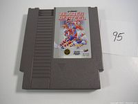 Front view of Blades of Steel NES cartridge showing label artwork and condition.