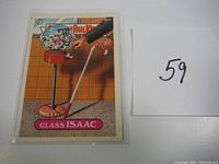 Front of Garbage Pail Kids trading card Glass Isaac #391a showing cartoon character with gumball machine head and mop.