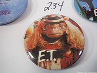 Close-up of E.T. in disguise pinback button with hat and wig