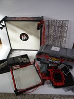 WWF wrestling ring, rings accessories, towers and plastic parts, with WWF Rumblers Rampage truck and other toy pieces shown