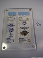 Photo shows two vintage 1992 baseball playoff tickets in plastic holder