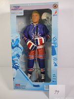 Full front view of unopened Wayne Gretzky hockey action figure in original light blue box showing figure in New York Rangers uniform.