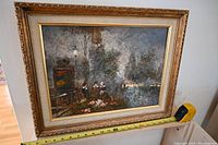 Framed oil painting, measuring approx. 22 inches wide, depicting a misty night scene with figures and street lamp.
