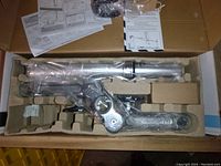 Visidec monitor mount arm and parts packaged neatly in original box with brown molded paper insert, parts wrapped in plastic.