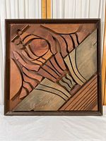 Full view of the square wooden mosaic wall art showing all carved wood pieces and frame.