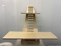 Front view of the standing desk converter showing both platforms and vertical support.