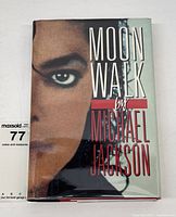 Front cover showing dust jacket with 'Moonwalk by Michael Jackson' text