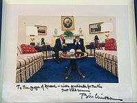 Full frontal view of signed 8x10 photograph showing image and inscription