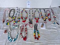 Wide shot of all ceramic jewelry pieces arranged on table