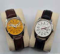 Front view showing both watches side by side