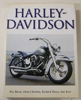 Oblique photo of the book cover showing the title, authors, and photo of Harley-Davidson motorcycle.