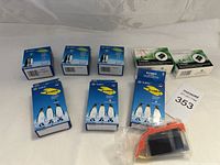 Overview of 8 ink cartridges including multiple G&G cartridges with penguin branding and two green and white boxed accessories.