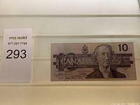 Front of Canadian $10 banknote featuring portrait and denomination.