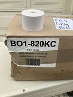 Close-up of the box label showing brand, model number B01-820KC, and measurements 1-3/4" x 155'.