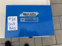 Closed blue metal Mastercraft case labeled Drill Bits