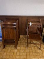 Overall view of chairs stacked and one open