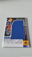 Front view of the Elias Pettersson 2020 NHL All-Star Game jersey card showing the embedded blue jersey swatch.