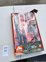 Full boxed set of Ozark Trail Camping Tool Set showing 12 pieces inside transparent case