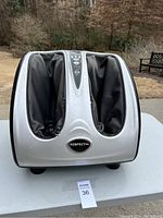 Front view showing the silver body and black fabric sleeves for feet and legs with the Perfect logo.