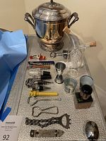Full lot overview showing silver ice bucket and all bar accessories