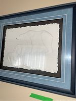 Full framed artwork image showing three embossed polar bears and frame details