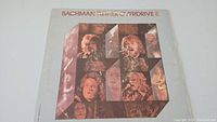 Front cover of Bachman-Turner Overdrive II vinyl album showing collage of band member photos