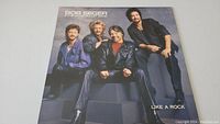 Front cover of Bob Seger Like A Rock vinyl album showing band members.