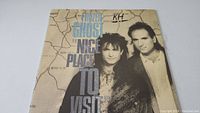 Front cover of Frozen Ghost Nice Place To Visit vinyl album showing band members and title with handwritten 'RH' mark.