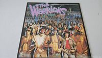 Front cover of The Warriors soundtrack vinyl showing the movie characters and title.