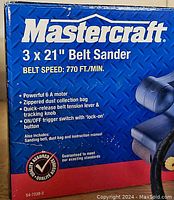 Original box showing Mastercraft branding, product name, and features such as 6A motor, dust collection bag, quick-release lever, and trigger lock button.