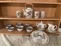 Full lot displayed on wooden shelf showing all items