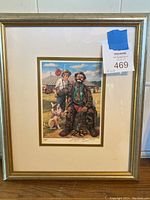 Full view of the framed and matted print with auction tag visible