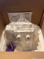 Machine in original box with foam packaging