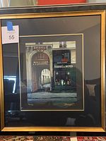 Full view of framed serigraph showing artwork and frame