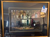 Framed serigraph print in black and gold frame showing full artwork