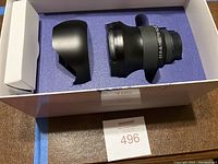 Lens and hood in original foam-lined box