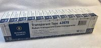 Box of 12 rolls of Business Source transparent tape showing label with product details and size.