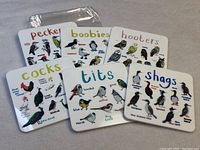 Six rectangular hard plastic coasters arranged showing humorous bird titles and illustrations on each coaster.