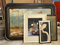 Group shot of all four framed artworks leaning together