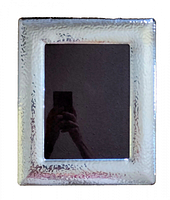 Front view showing the hammered sterling silver border and photo opening