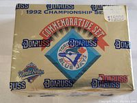 Photo of front and top of the sealed vintage card set box with Donruss and Blue Jays logos and championship markings.