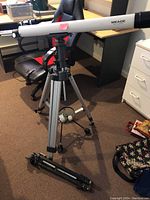 Full view of the Meade telescope mounted on the silver Gemini tripod with second tripod on the floor.