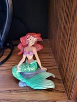 Front view of Ariel figurine showing detailed painted finish and pose.