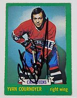 Front side of 1973-1974 Yvan Cournoyer Montreal Canadiens hockey card with hand signed autograph in black marker.