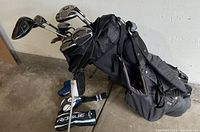 Overview of black Pinehurst stand bag with assorted clubs and headcovers